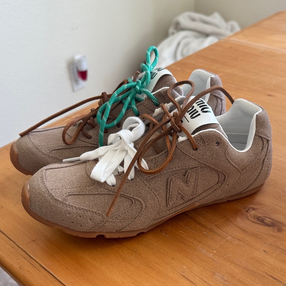 Brown Sneakers with White and Teal Laces